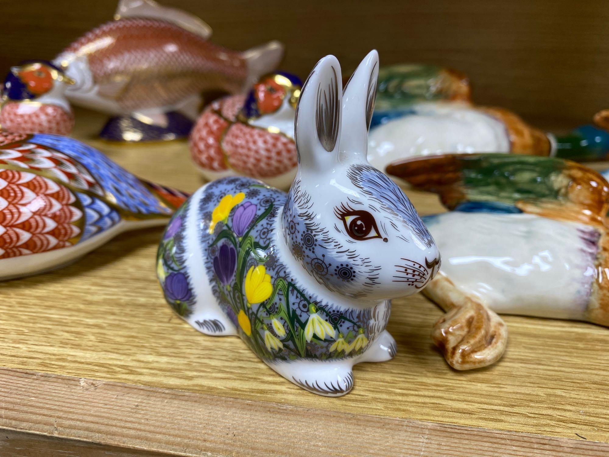 A graduated set of Beswick flying ducks and five Royal Crown Derby animal paperweights and another similar rabbit, fish 18cm